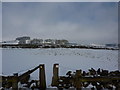 Stile and path across snow fields