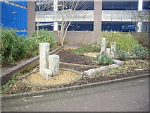 SU4112 : A small garden between a multi-storey carpark and the railway by Stanley Howe