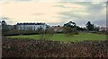 Seaton: Looking over the hedge into Cliff Field