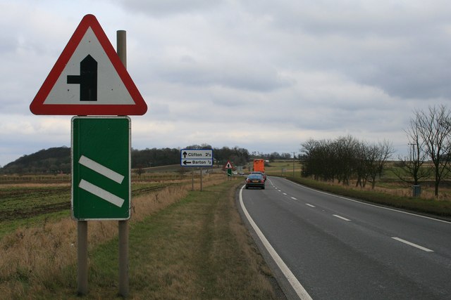 Various signs for Barton
