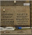 TQ3183 : Old painted shop advertisement by Jim Osley