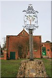 SU9455 : Pirbright village sign by Paul E Smith