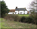 TM3597 : Elm Farm (farmhouse) in Stubbs Green by Evelyn Simak
