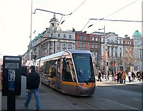 O1534 : A Luas tram at the junction of Abbey Street and O'Connell Street by Eric Jones