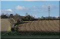 Fields and line of pylons