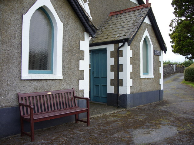 Chapel entrance and memorial bench