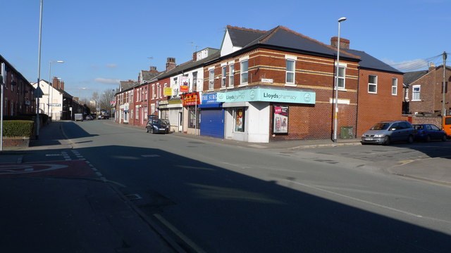 A row of shops and houses on Reddish Lane