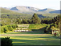 Shooting butts at Glenmore Lodge with cairngorm behind.