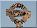SY9499 : Sturminster Marshall: detail of Newton Cross signpost by Chris Downer