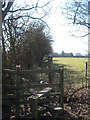 Stile and High Weald Landscape Trail heading towards Swan Street