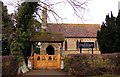 The Lych gate to St Barnabas Church