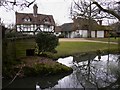 House and pond off West End Lane