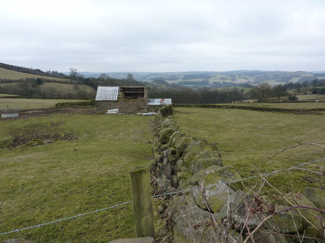 Dry stone walls and a barn with half a roof
