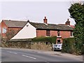 Old house at right angles to Woodhouse Lane