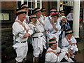 Kirtlingtom Morris Men posing outside the Hand Hotel