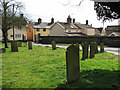 Cottages in The Street viewed across All Saints churchyard