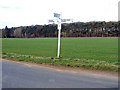 Signpost near Honeyhill Farm