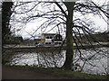 Cars travelling across the dam towards Barnsley