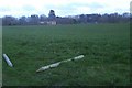 Longmoor House across the grassland.....