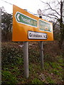 SY6394 : Grimstone: signs facing the A356 by Chris Downer