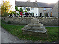 Remains of the cross, in front of The Plough