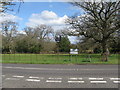 Monks Gate village sign at the junction of the A281 and Nuthurst Road