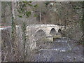 NY7959 : Bridge over the River Allen, A686 by John Lord