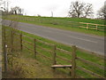 Footpath crosses Cockering Road near Milton Manor Farm