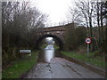 NY6228 : Railway bridge and flooded road, Newbiggin by John Lord