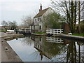 Canal lock and old cottage