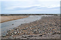 Craigmill Burn crosses the beach