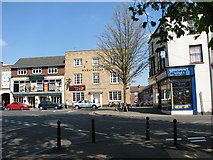 TF4609 : Shops by St Peter's gardens, Wisbech by Evelyn Simak