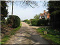 Cottages alongside drive to Loves Farm