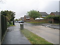 A wet May morning in Rectory Farm Road