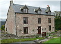 Fine stone farmhouse opposite the church in Llanarmon yn Ial