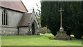 Entrance porch and First World War memorial in St. Mary