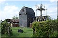 SP7401 : Chinnor post mill undergoing restoration. by Simon Mortimer