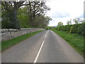 The B6437 heading past the lands of Milne Graden