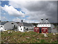 NR4146 : Storm clouds gather over the Ardbeg distillery by Andrew Abbott