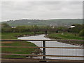 The view downstream from Rumsen Bridge on the river Taw