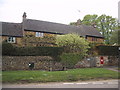 Litter bin, bench and post-box in Horley