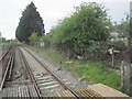 SY8486 : Looking west along railway at Wool level crossing by John Firth