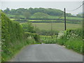 Road drops towards Leworthy Cross