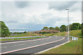 New footbridge over a new road at Inshes