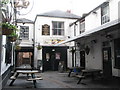 NZ2464 : The Old George, off Cloth Market, NE1 by Mike Quinn