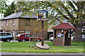 Village sign and bus stop - Buckden