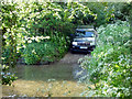 Car approaching the ford near Latchford