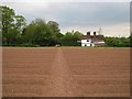 Crossing farm fields, off Eaves Green Lane