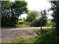 TM4282 : Footpath/farm driveway crossroads by Glen Denny