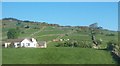 Hillside with a farm lane and a patchwork of small stone wall enclosed fields